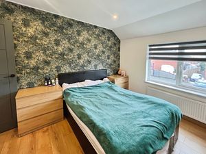 Bedroom One- click for photo gallery